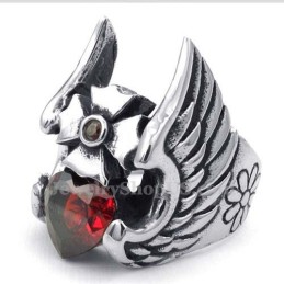 Titanring Med Korsfjäder Och Röd Zirkon