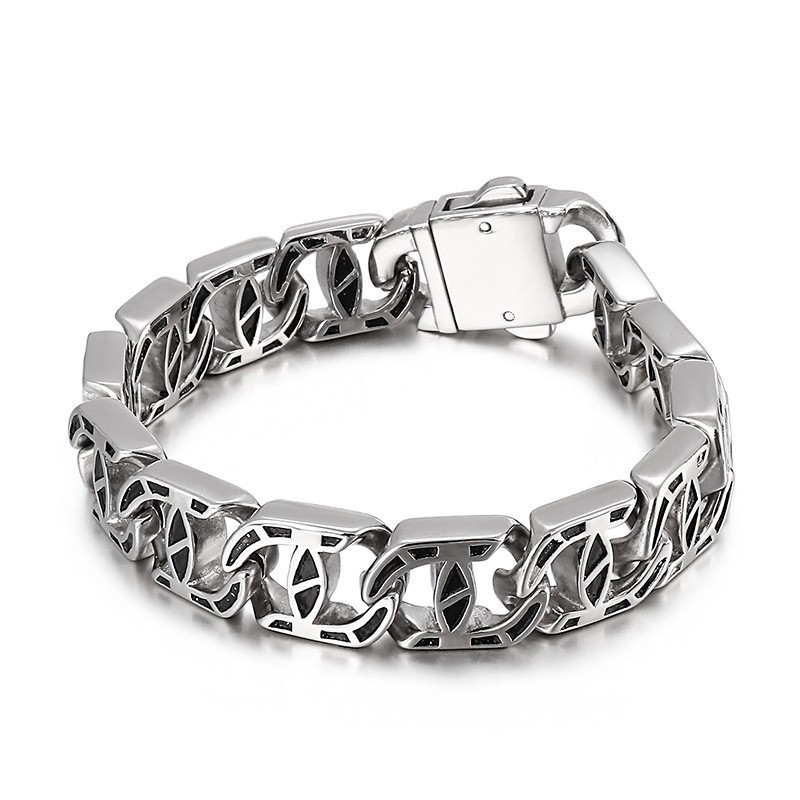 Elegant Herrarmband Med Gjutna Charms I Titan Elegant Herrarmband Med Gjutna Charms I Titan