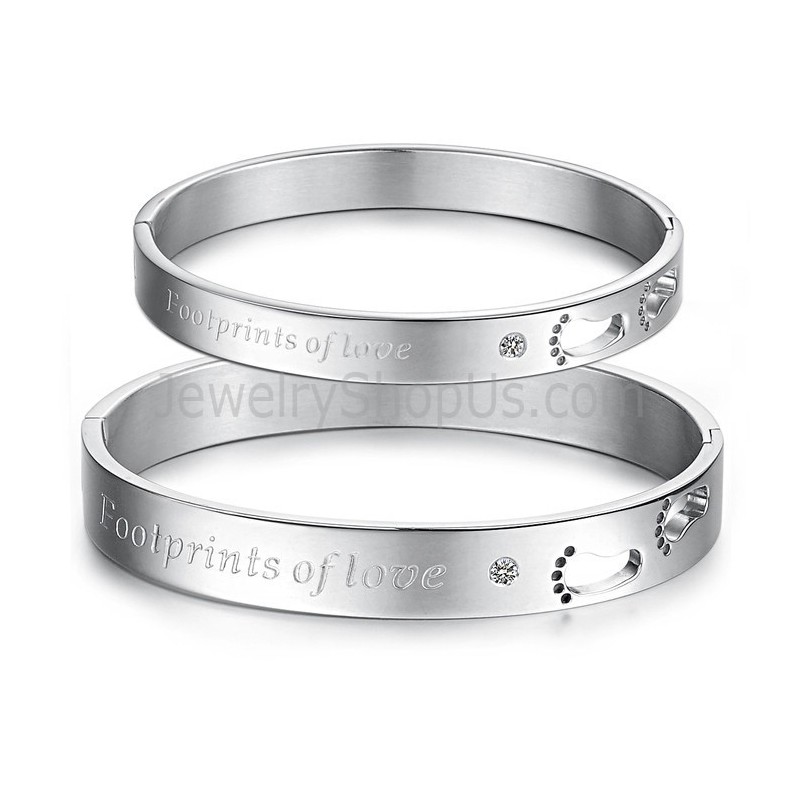 Tatanium "Footprints Of Love" Pararmband Med Ihåliga Fotspår Och Strass C850 Tatanium "Footprints Of Love" Pararmband Med Ihåliga Fotspår Och Strass C850